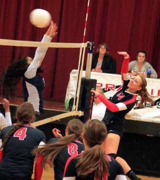 Sarah Seubert goes for a right side kill against Lapwai. Also shown from left are Shayla VonBargen, Hailey Danly and Krystin Uhlenkott.