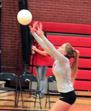 Chaye Uptmor makes a pass. She was back in the Libero position she played last year due to a back injury that keeps her from playing in a hitting position.