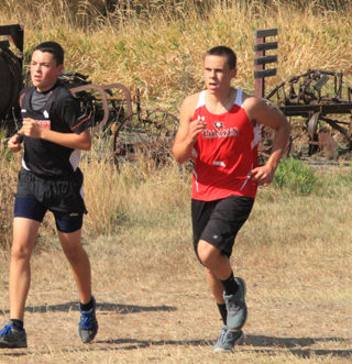 Grant Gehring with 1 turn left in the race.