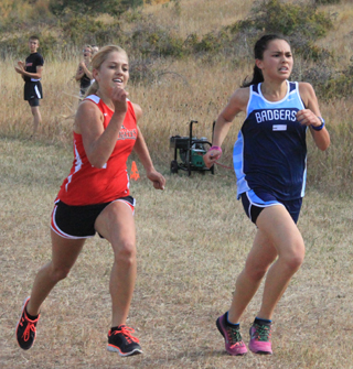 Kylie Tidwell outsprinted the Bonners Ferry runner to the finish to take 6th place in the girls varsity race.