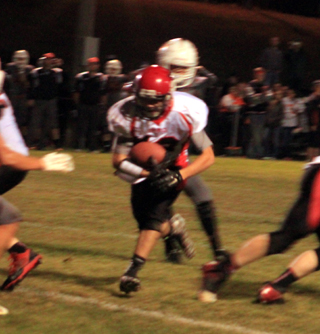 Brandon Anderson goes through a big hole blocked by the Prairie line for a touchdown.