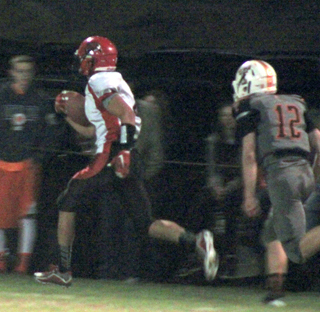 Isaiah Shears shows his heels to a Troy defender as he races down the sidelines for his first of three touchdowns in the game.