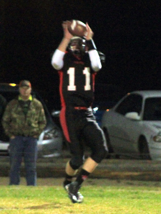 Shown is a wide open Jake Bruner catching Terran Peery's pass.