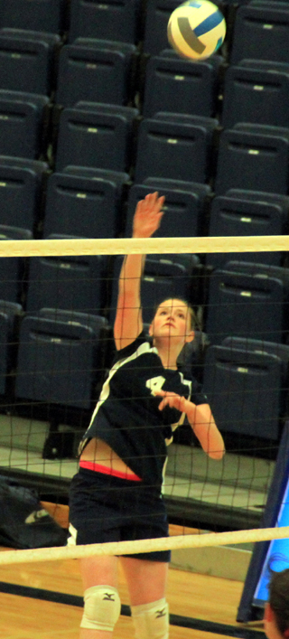 Bridget Beckman spikes the ball