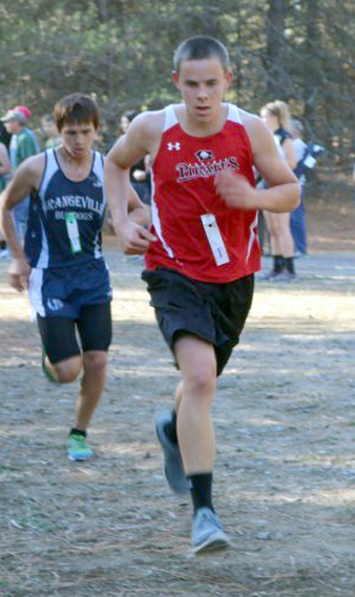Grant Gehring was the top finisher for the Prairie boys crosscountry team at Regionals but fell short of a trip to state. Photo by Kellie Bruner.