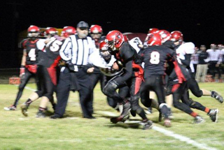 Luke Wemhoff, middle, has clear sailing as the Prairie lineman block off all the Wallace defenders He wound up going 48 yards for a touchdown on this play. Photo by Kellie Bruner.