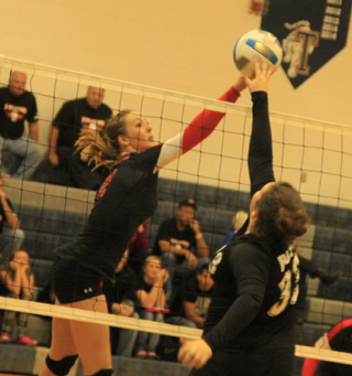 Mykaela McWilliams wins a joust at the net against Butte County.