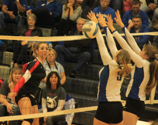 Mykaela McWilliams pounds one past Genesee's blockers in the championship match.