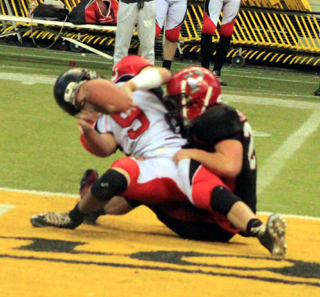 Calvin Hinkelman tackles Oakley’s quarterback. One of 7 times he was tackled for a loss in the game.