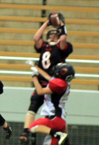 Devin Bruegeman leapt high over an Oakley defender to haul in a 2-pt. conversion catch.