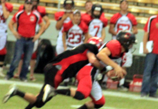 Isaiah Shears sacks Oakley's quarterback.