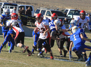 Calvin Hinkelman picked up big yards on this carry after the offensive line gave him a big hole to run through.