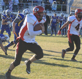 Jake Bruner got loose around the right side for a third quarter touchdown. Also shown is Isaiah Shears.