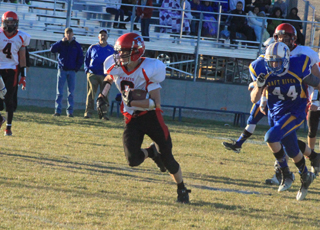 Luke Wemhoff went trhough a big hole on a trap block play for a 45 yard touchdown that broke Raft River's momentum and put the Pirates up by 14 in the fourth quarter. He later made an end zone interception that sealed the win.