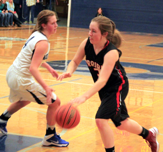 Angela Wemhoff drives to the hoop past a Grangeville defender.