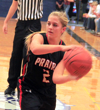 Kylie Tidwell passes into the post.