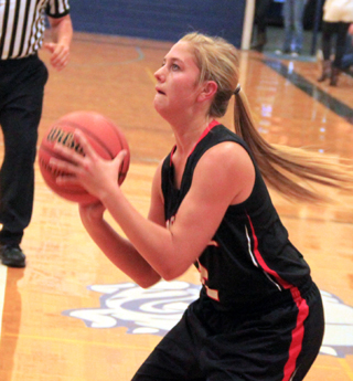 Kylie Tidwell puts up a 3-pointer at Grangeville.