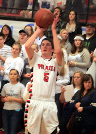 Hunter Chaffee provided a scoring spark off the bench as he is about to connect on a 3-pointer.