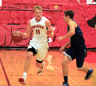 Jake Bruner brings the ball upcourt.