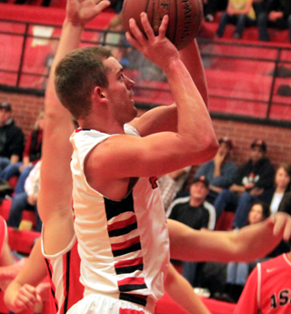 Isaiah Shears goes for a lay-up against Asotin.