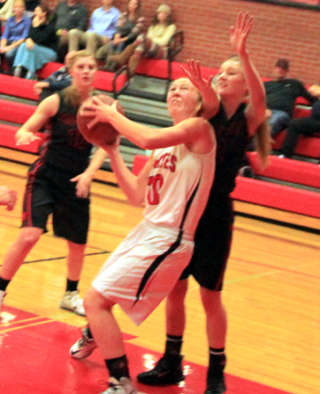 Talyss Lustig looks to put up a shot against Moscow.
