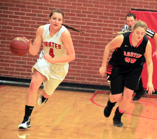 Shayla VonBargen heads up court after stealing the ball.