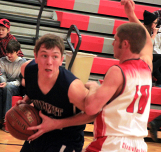 Summits Patrick Chmelik looks to put up a shot from the low post at C.V.