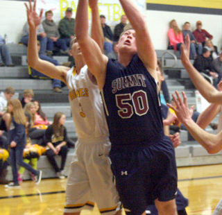 Chris Osborne grabs a rebound at Highland.