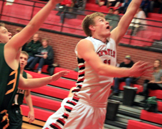 Jake Bruner scores a lay-up against Potlatch.