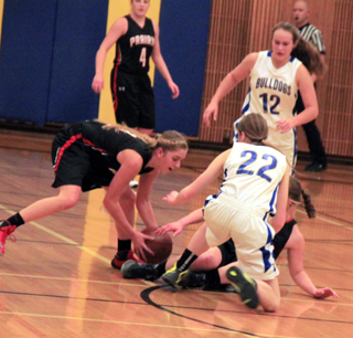 Its a scramble for the ball at Genesee. Hailey Danly, hidden behind 22, knocked the ball loose and Kylie Tidwell picks it up. In the background is Shayla VonBargen.