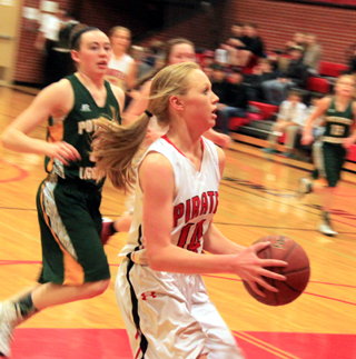 Leah Higgins drives toward the hoop after making a steal on the defensive end.