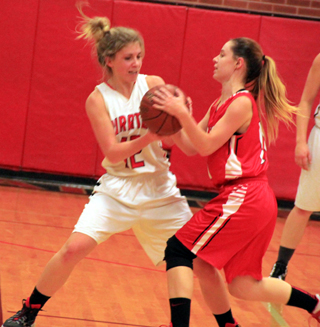 Chaye Uptmor forces a jump ball on defense, which resulted in a steal as Prairie had the possession arrow in their favor.
