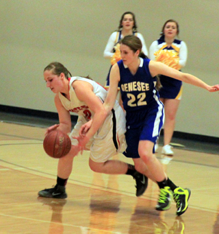 Hailey Danly steals the ball from Genesees Courtney Burt.