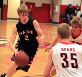Tyson Schlader drives into the lane at Moscow. He had a big game on the boards with 15 rebounds and turned 4 offensive rebounds into points.