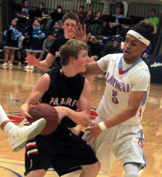 Brandon Higgins is defended at the top of the key. Also shown is Hunter Chaffee.