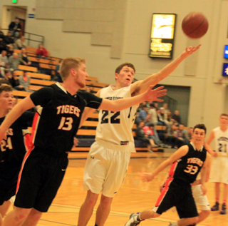 Patrick Chmelik goes after a rebound in the Kendrick game.