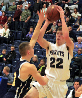 Patrick Chmelik goes for a shot against Logos.