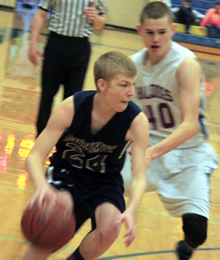 Caleb Currier handles the ball against Rockland.