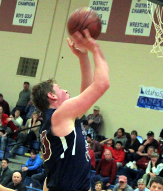 Chris Osborne scores a lay-up against Dietrich.