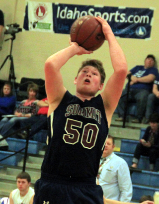 Chris Osborne shoots against Rockland at State.