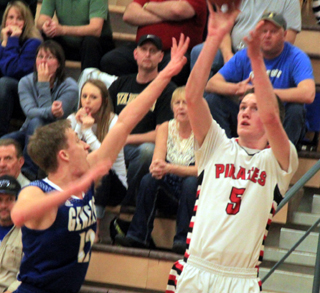 Hunter Chaffee shoots for 3 against Genesee at State.