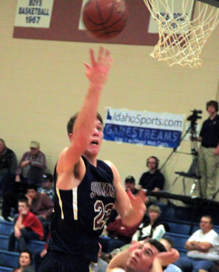 Patrick Chmelik goes for a lay-up against Dietrich.