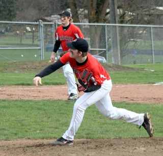Devin Bruegeman had a great first start of the season, outdueling Kamiahs Brandon Ballantyne for a 3-2 win. Also shown is Calvin Hinkelman.