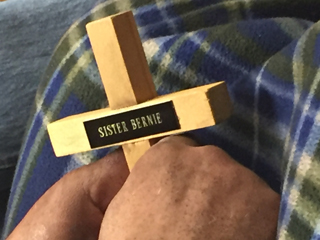 A closeup of one of the crosses memorializing Sister Bernie Ternes.