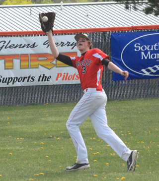 Daniel Mager makes a catch in left field against Nampa Christian.