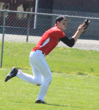 Centerfielder Jake Bruner runs down a fly ball in the first Potlatch game.