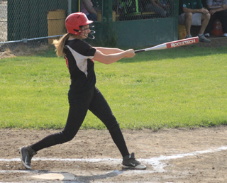 Hanna Ross takes a powerful cut. She had 2 doubles and 2 triples in the doubleheader at Culdesac.