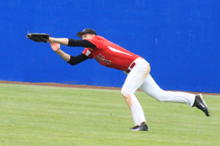 Jake Bruner makes a great catch against Genesee to help stop a late rally in the second place game.