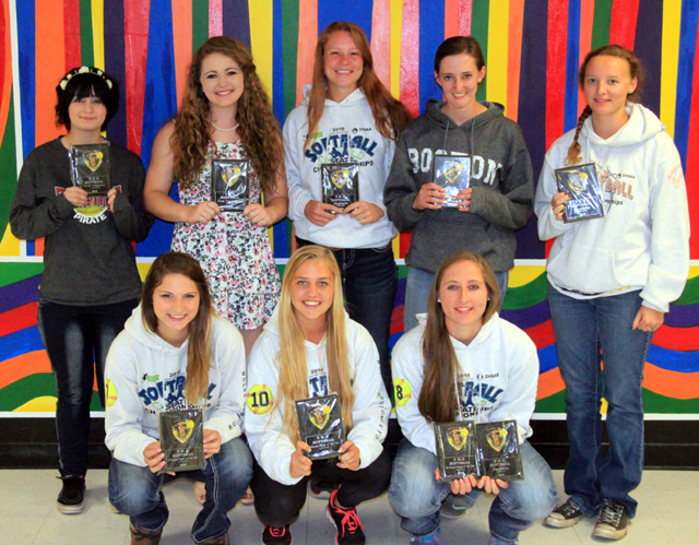 Hailey Danly gets congratulated by coach Jeff Martin as she rounds third after hitting a go-ahead grand slam homer against Potlatch.