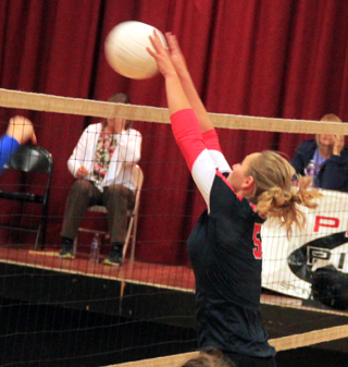 Mykaela McWilliams blocks an Orofino spike.